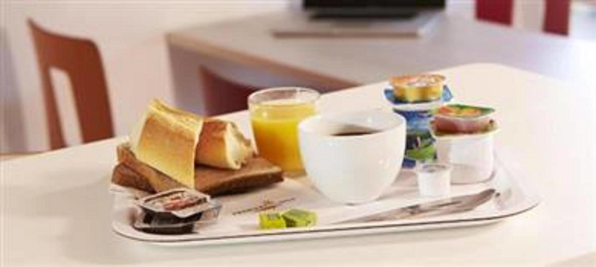 普瑞米尔艾福尔经典酒店 埃夫勒 外观 照片 A typical breakfast